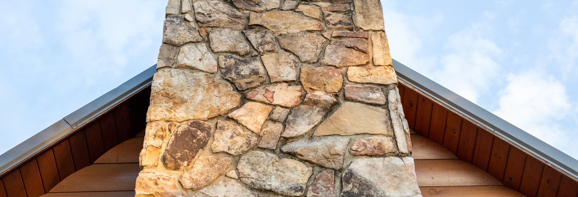 Stone Chimney On Log Cabin